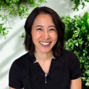 Portrait of a smiling dentist at a dental office in Leduc, Alberta